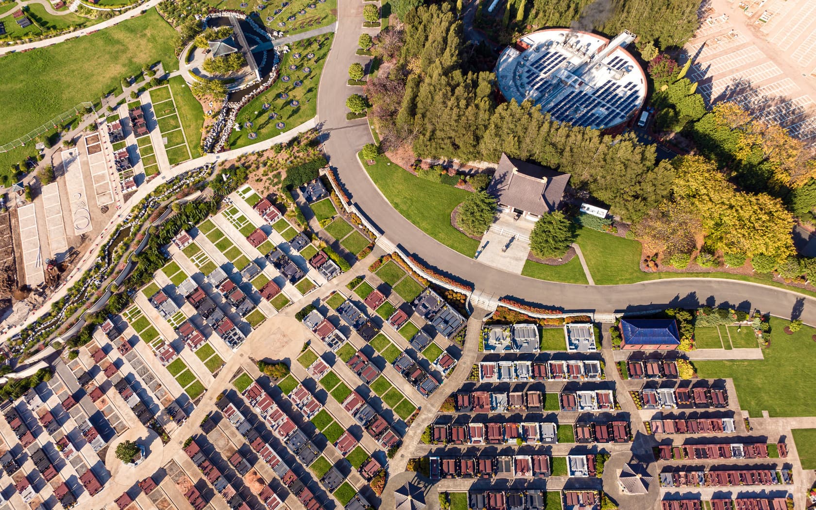Springvale Botanical Cemetery Crematorium – white building located in the top right corner of the image, surrounded by serene landscaping.