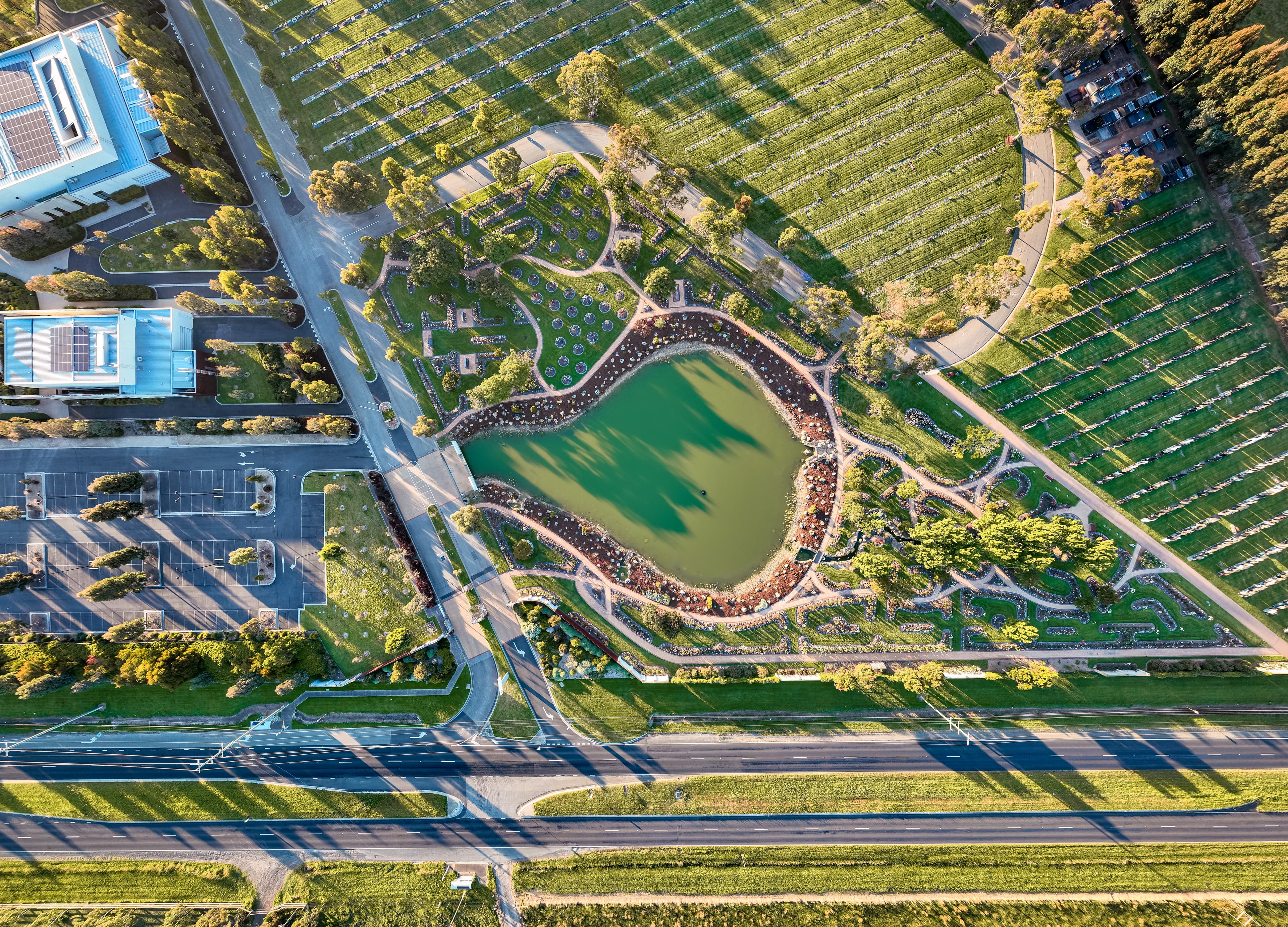 Aerial view of genesis lake and surrounding gravesite areas at Bunurong Memorial Park