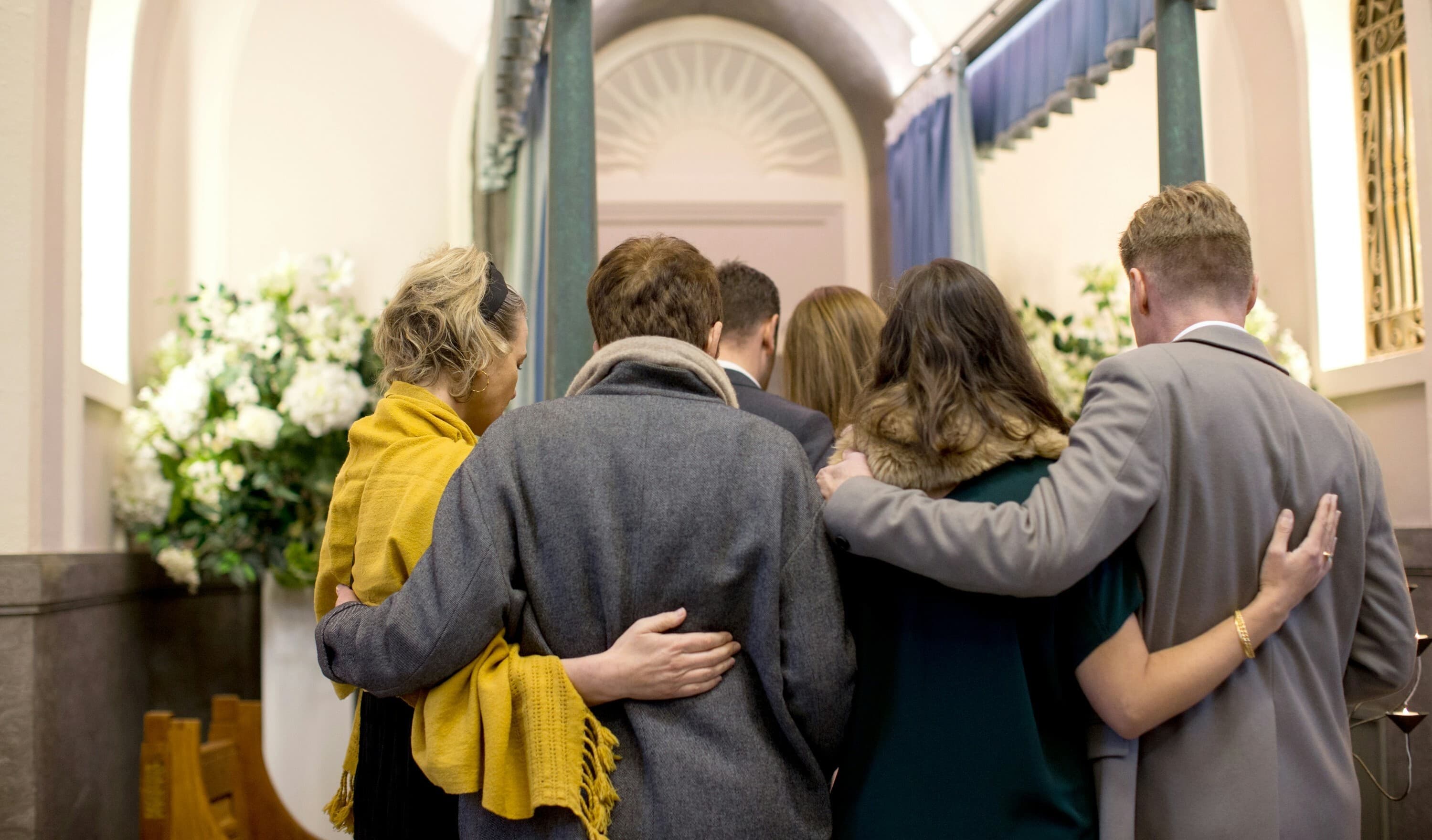 chapel family hugging