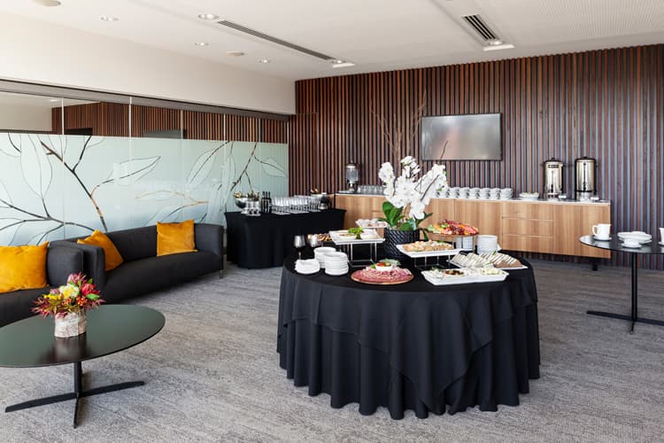 Elegant cemetery wake function room with seating and catering arrangements, offering a respectful space for memorial gatherings